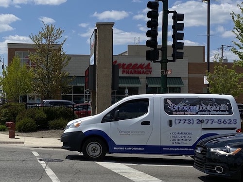 Omega Locksmith van on a service call in Lyons, Il