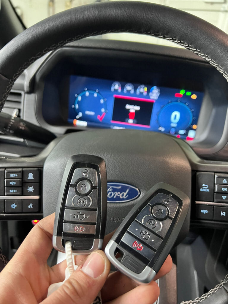 Two replacement smart keys for a 2024 Ford F-150 in Garfield Ridge